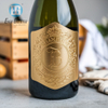 Etichetta di vino in bottiglia di champagne in metallo